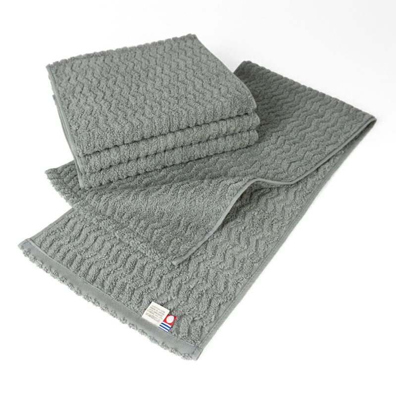 今治タオル スリムフェイスタオル 22㎝×82㎝ 4枚セット タオルホルダー トイレ 洗面所 日本製 スリムタオル おすすめ 速乾 吸水 かわいい ふわふわ 波模様 綿100％ 軽量 ジャガード デイリーユース 蛍光染料不使用 ニュアンスカラー 一人暮らし チャコール ベージュ ライトブルー パープル